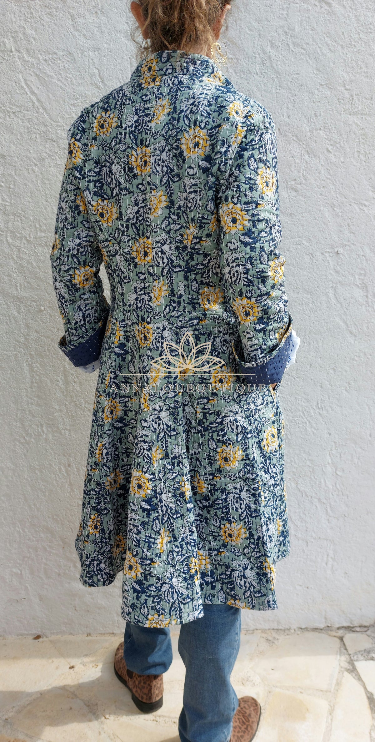 Embroidered navy and green frock coat