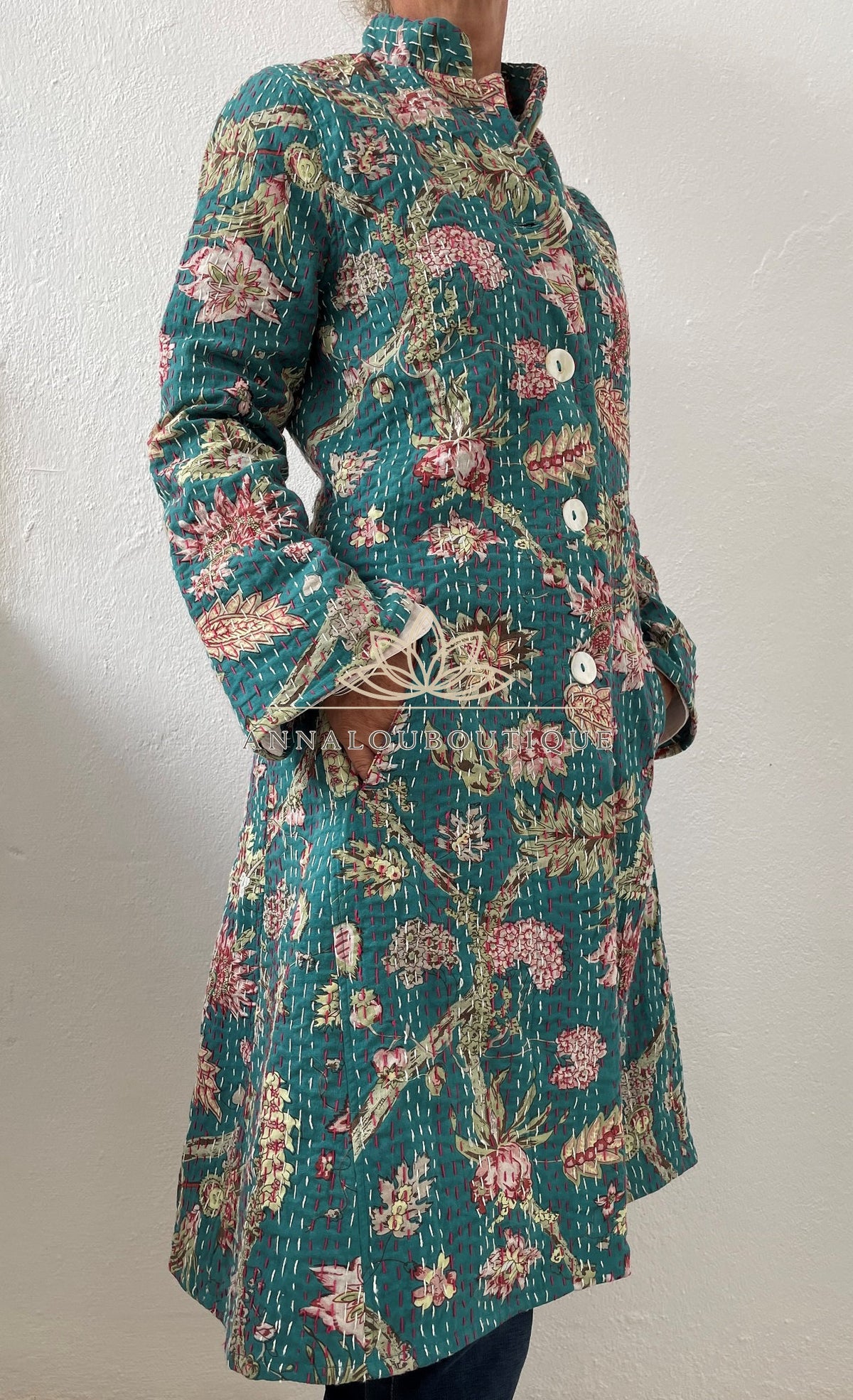 Teal frock coat with pink hydrangeas