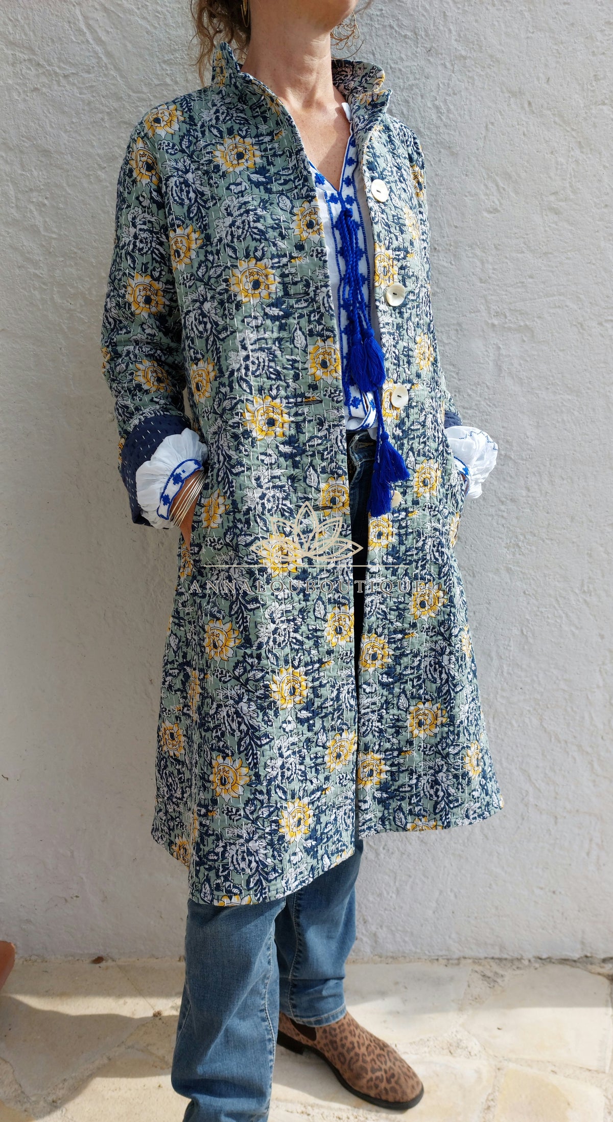 Embroidered navy and green frock coat