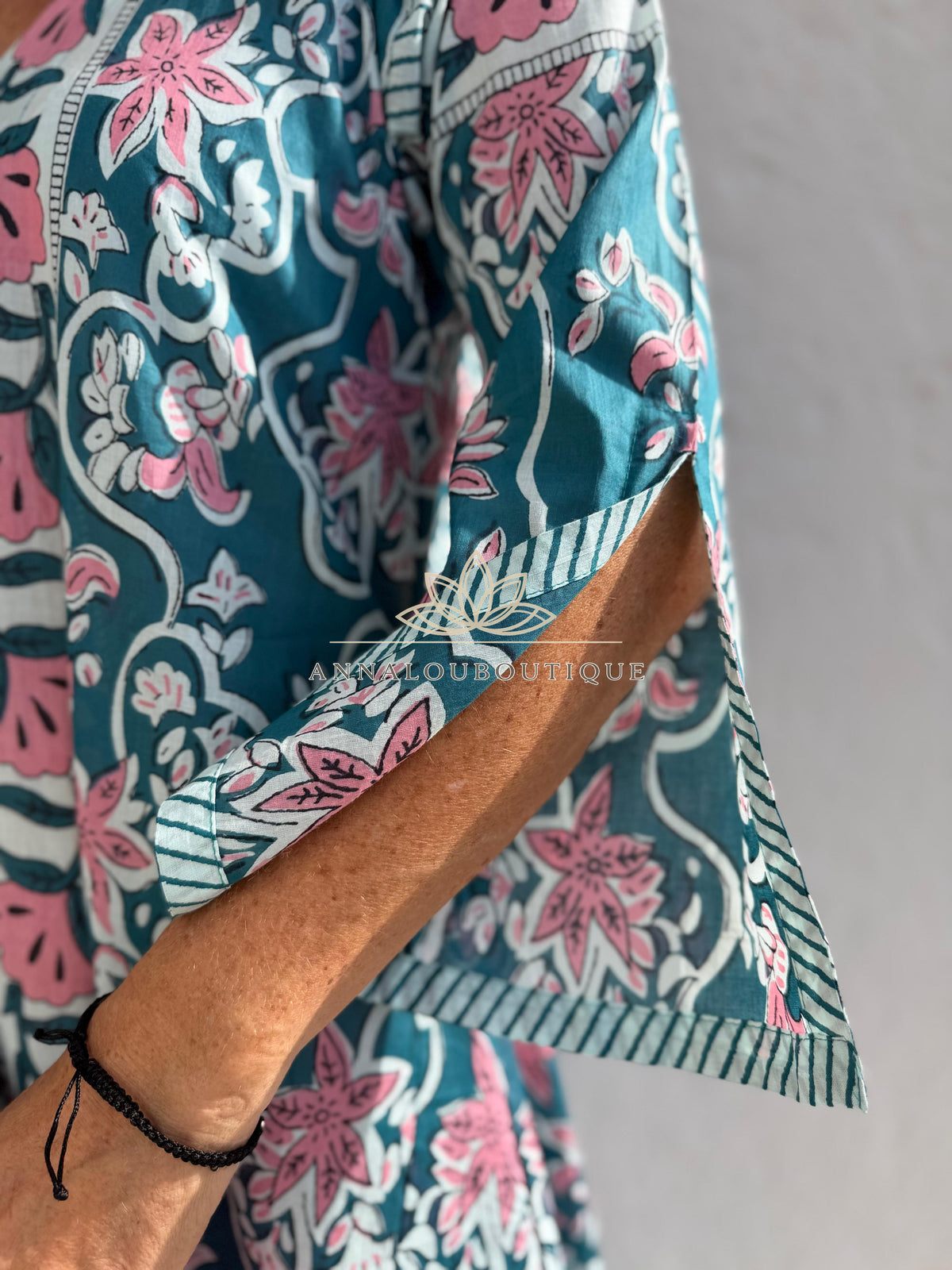 Long flared cotton kaftan in teal and pink