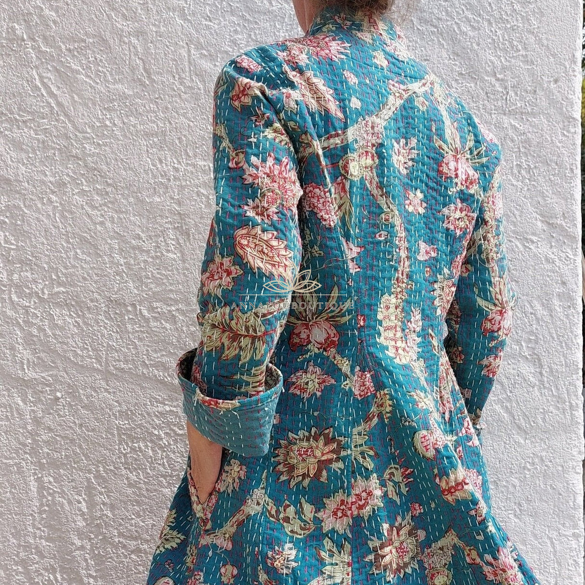 Teal frock coat with pink hydrangeas