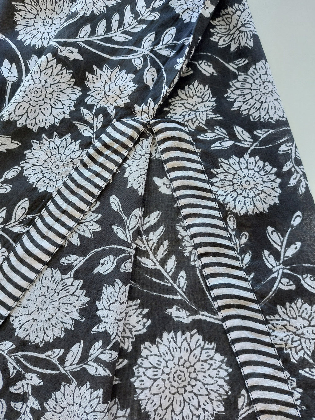 unique piece poncho in soft cotton black and white floral pattern, black sequins lace finishing on sleeves, side slits, casual summer outfit