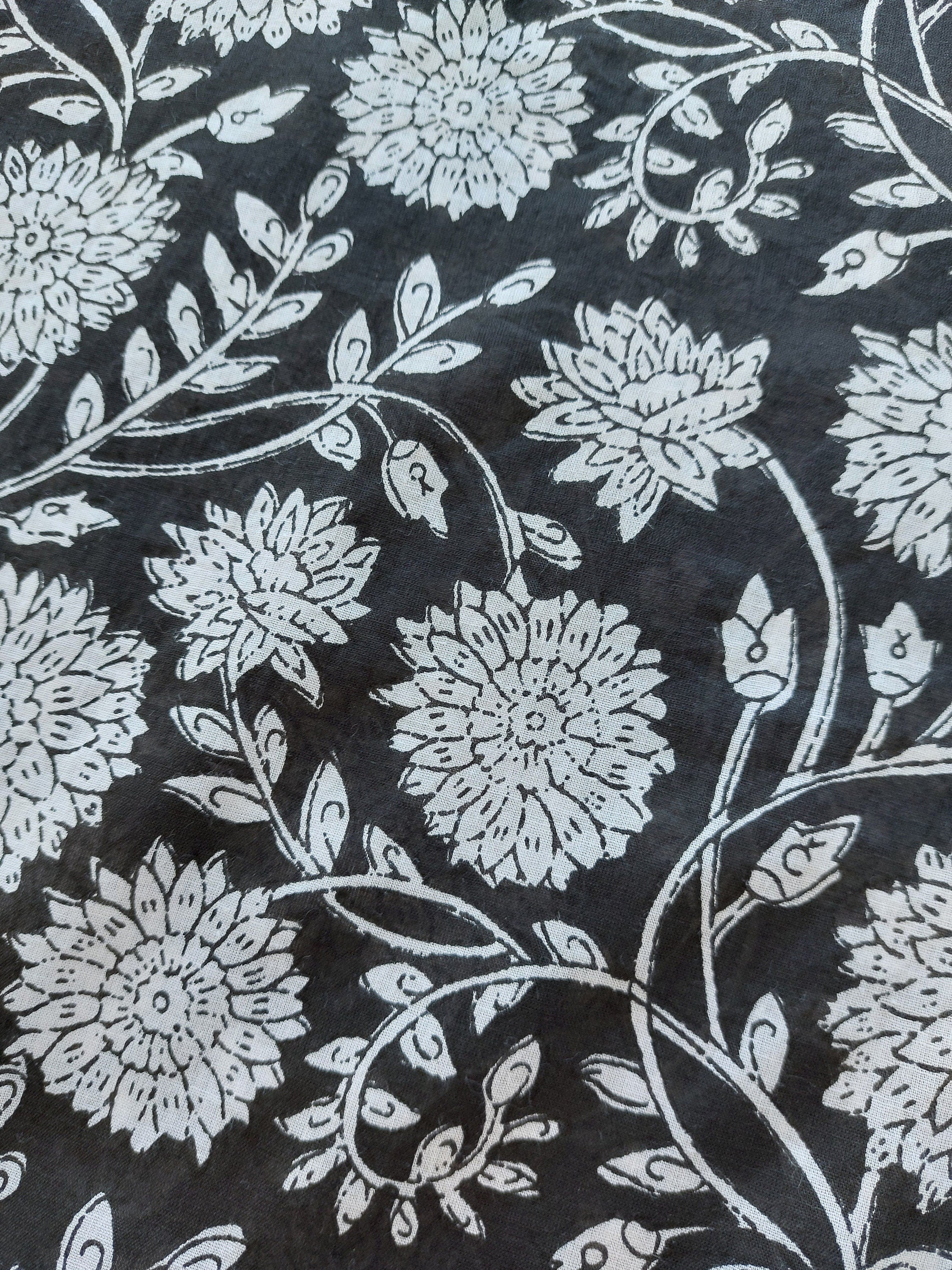 unique piece poncho in soft cotton black and white floral pattern, black sequins lace finishing on sleeves, side slits, casual summer outfit
