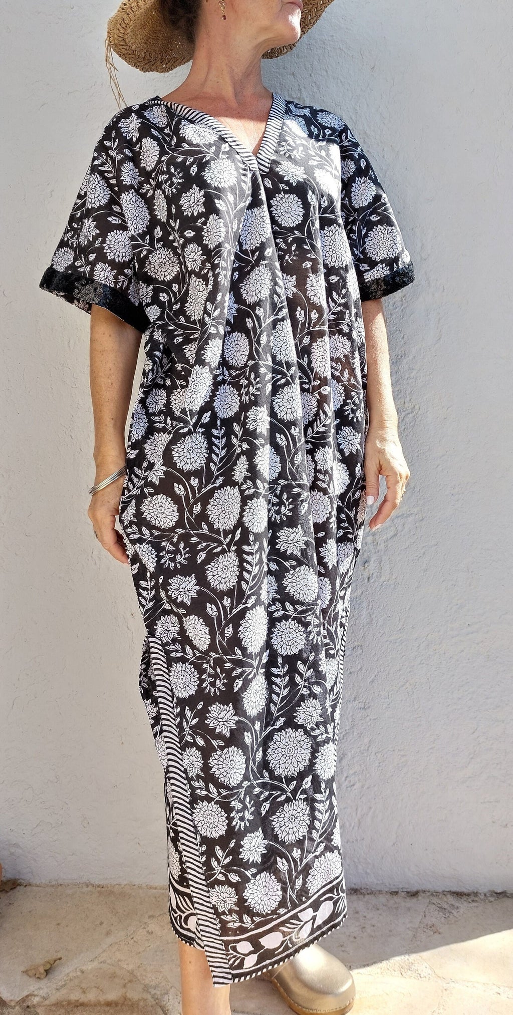 unique piece poncho in soft cotton black and white floral pattern, black sequins lace finishing on sleeves, side slits, casual summer outfit