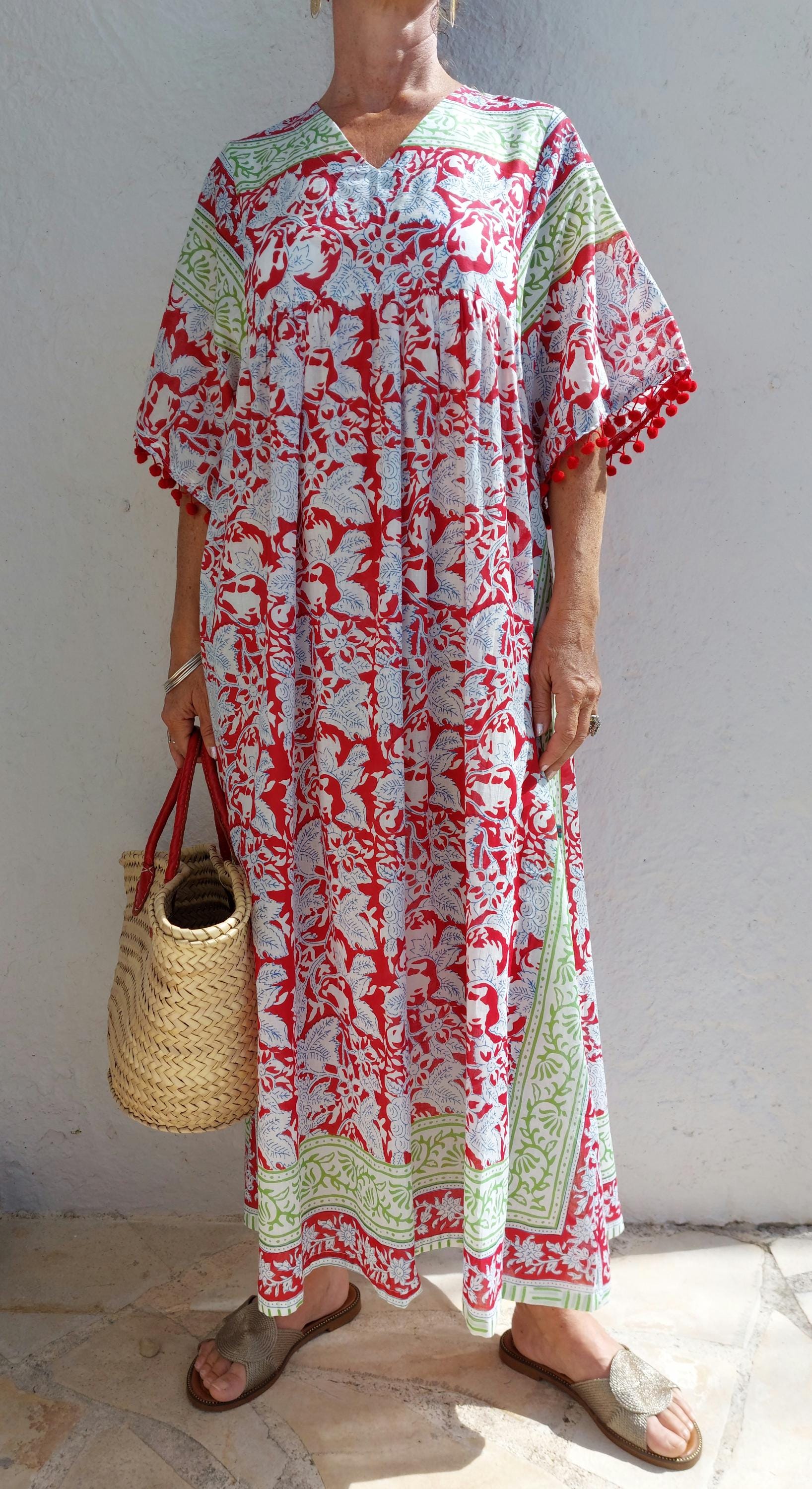 oversize dress in soft cotton, exclusive design, red pompons lace on sleeves, floral red pattern, green border, side pockets