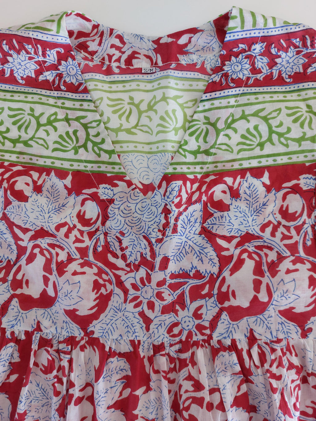 oversize dress in soft cotton, exclusive design, red pompons lace on sleeves, floral red pattern, green border, side pockets