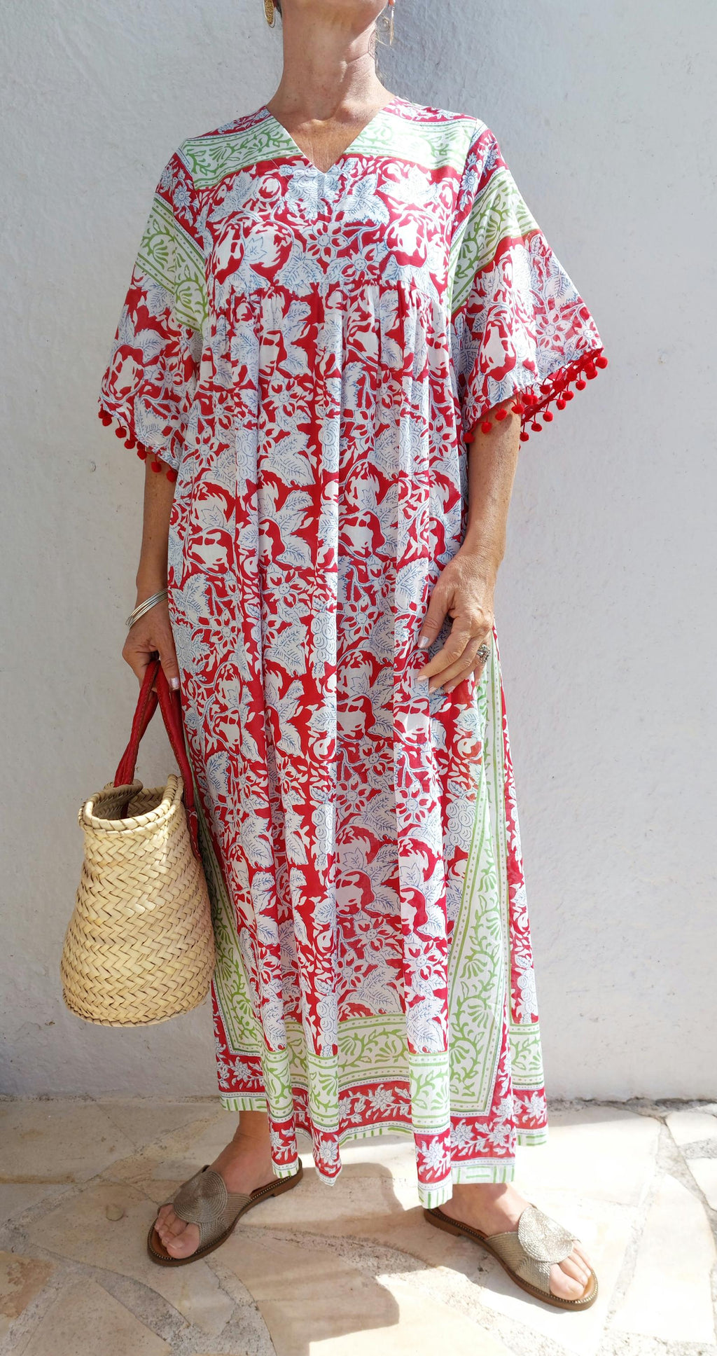 oversize dress in soft cotton, exclusive design, red pompons lace on sleeves, floral red pattern, green border, side pockets