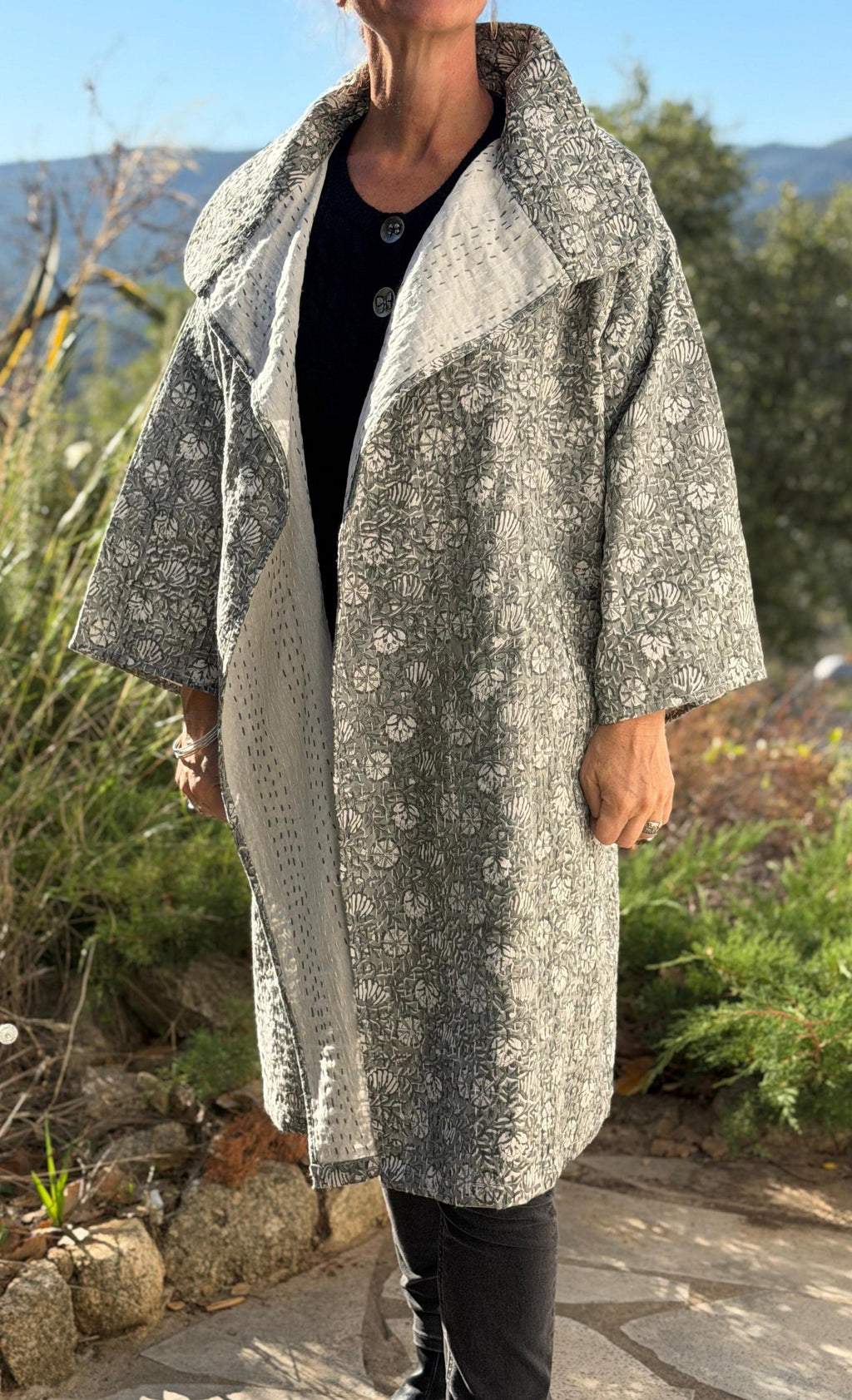 long oversize jacket,unique original design,in hand block printed color,in the shades of grey,floral print,large collar,large sleeves.