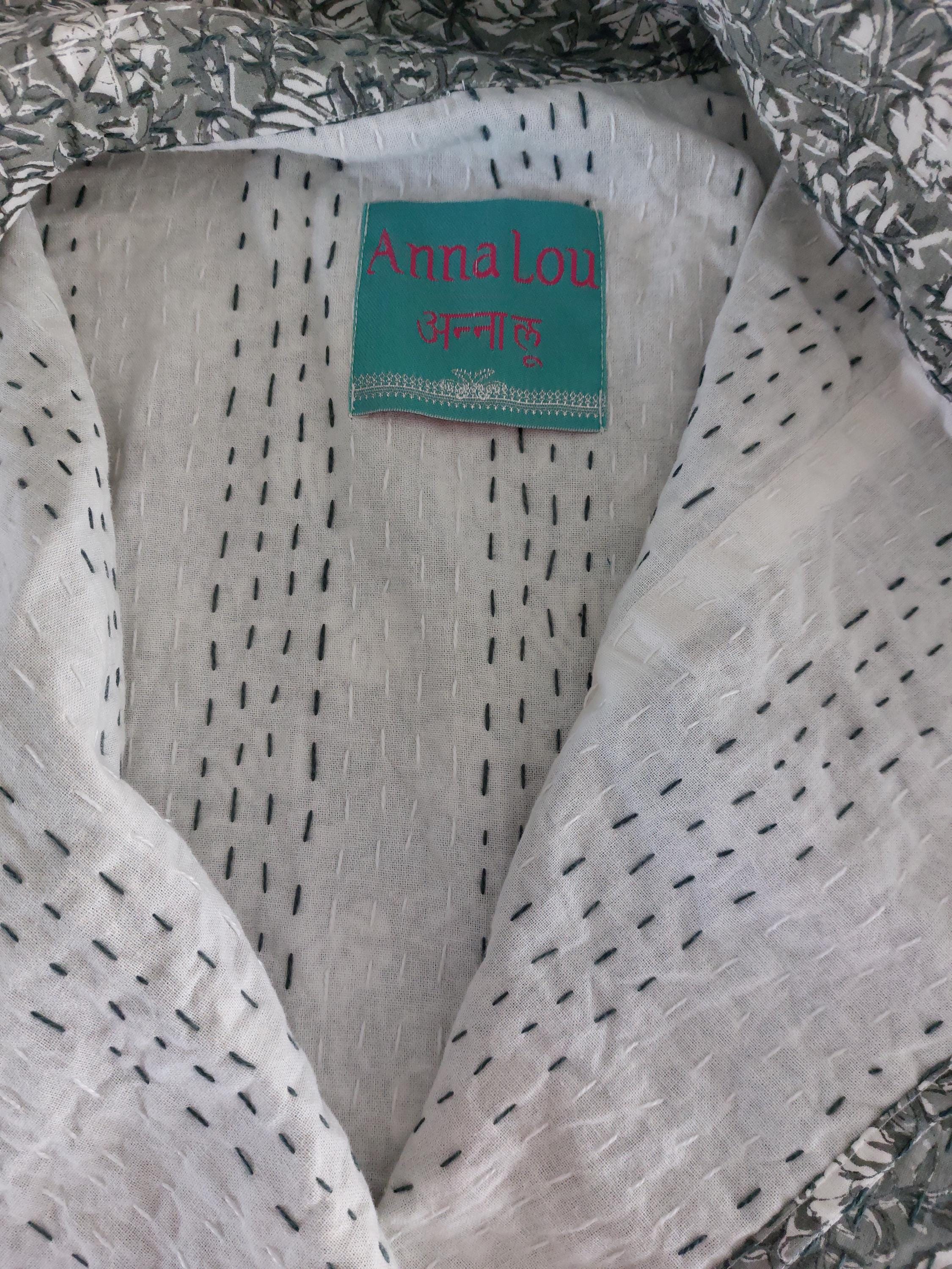 long oversize jacket,unique original design,in hand block printed color,in the shades of grey,floral print,large collar,large sleeves.