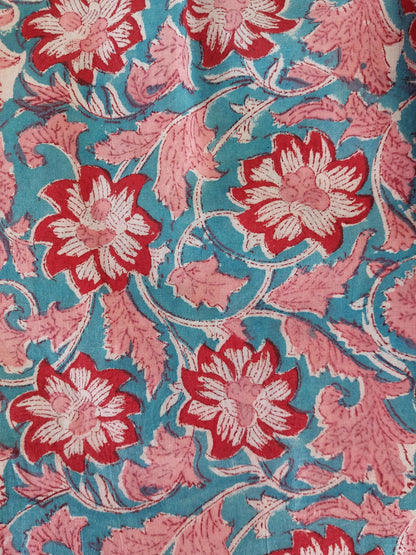pleat long dress in hand block printed cotton,floral pattern in the shades of pink,red and blue,casual summer outfit