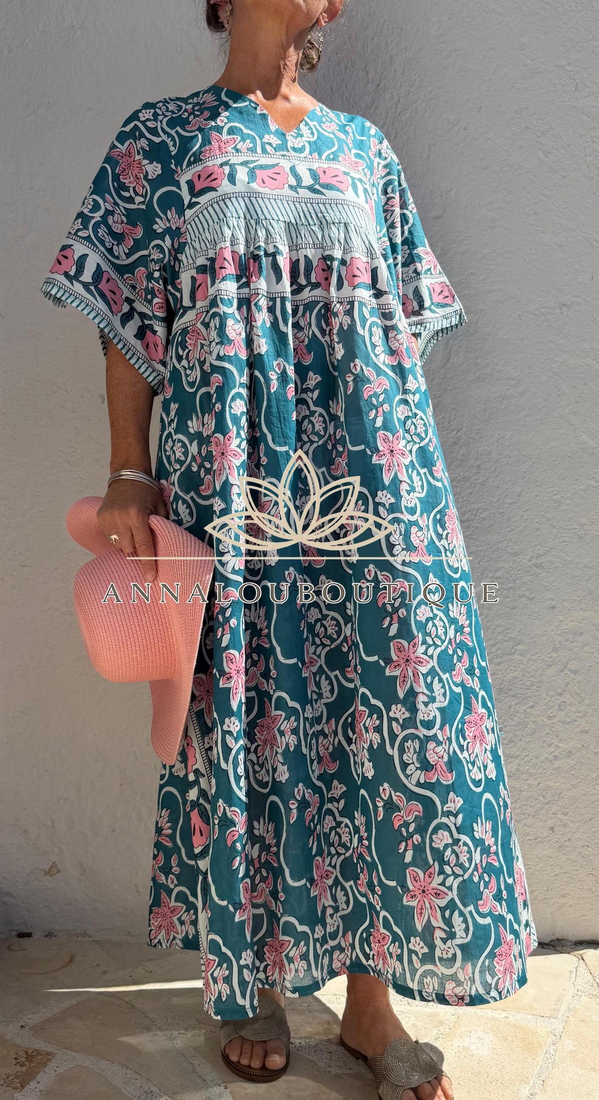 Loose teal dress with pink flowers