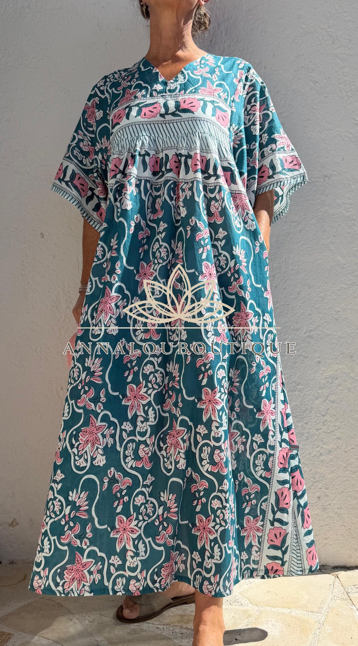 Loose teal dress with pink flowers