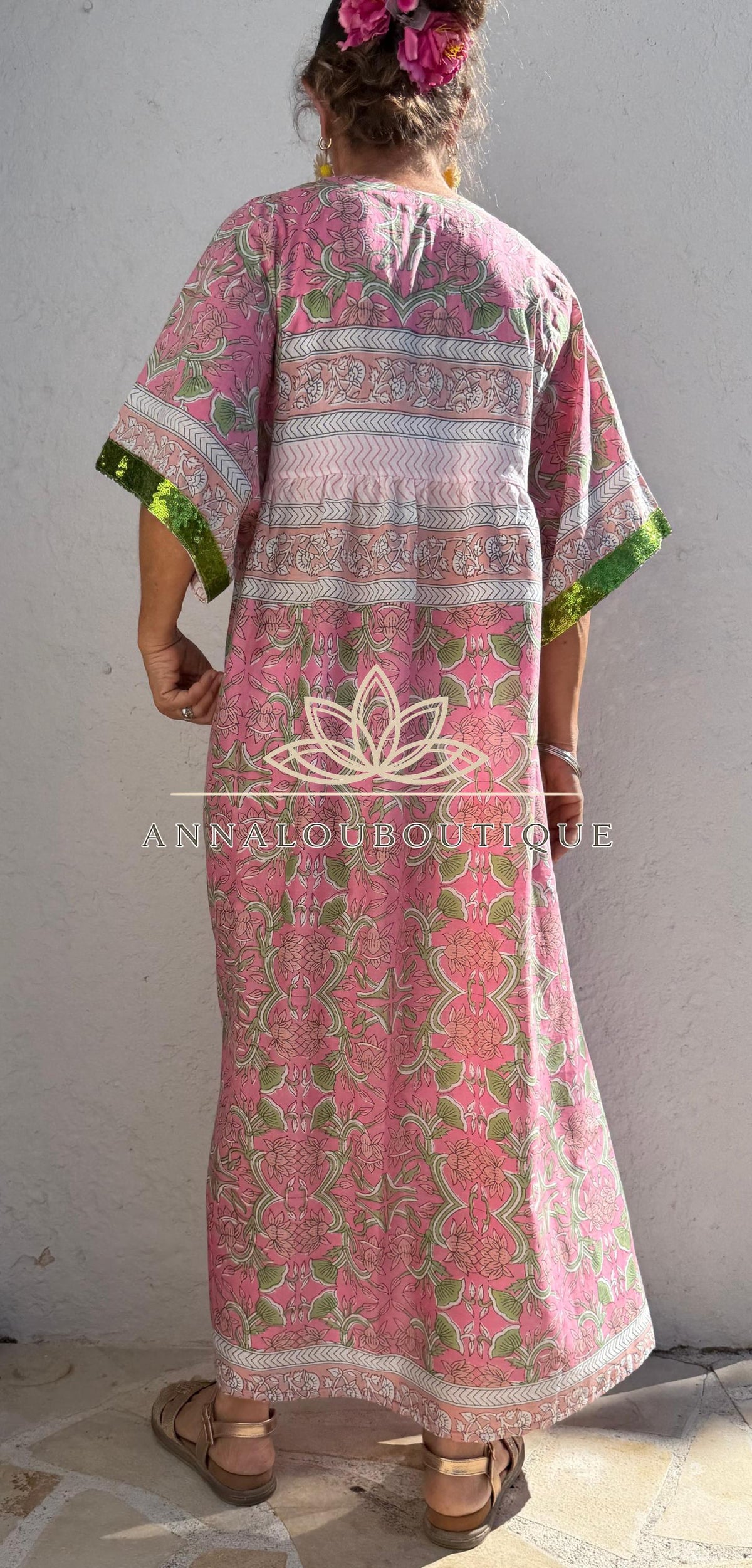 Loose pink and green dress with sequin sleeves