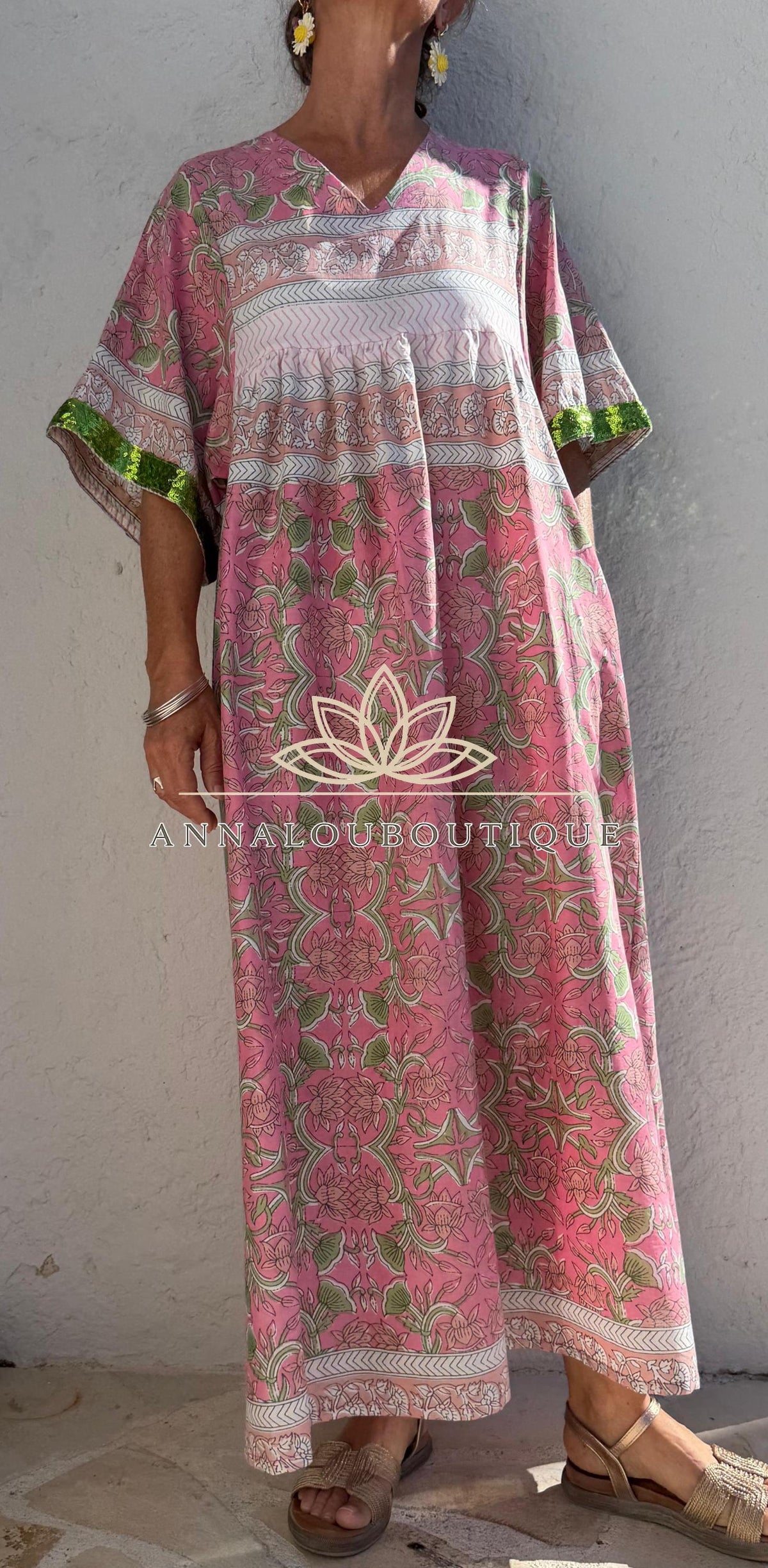 Loose pink and green dress with sequin sleeves