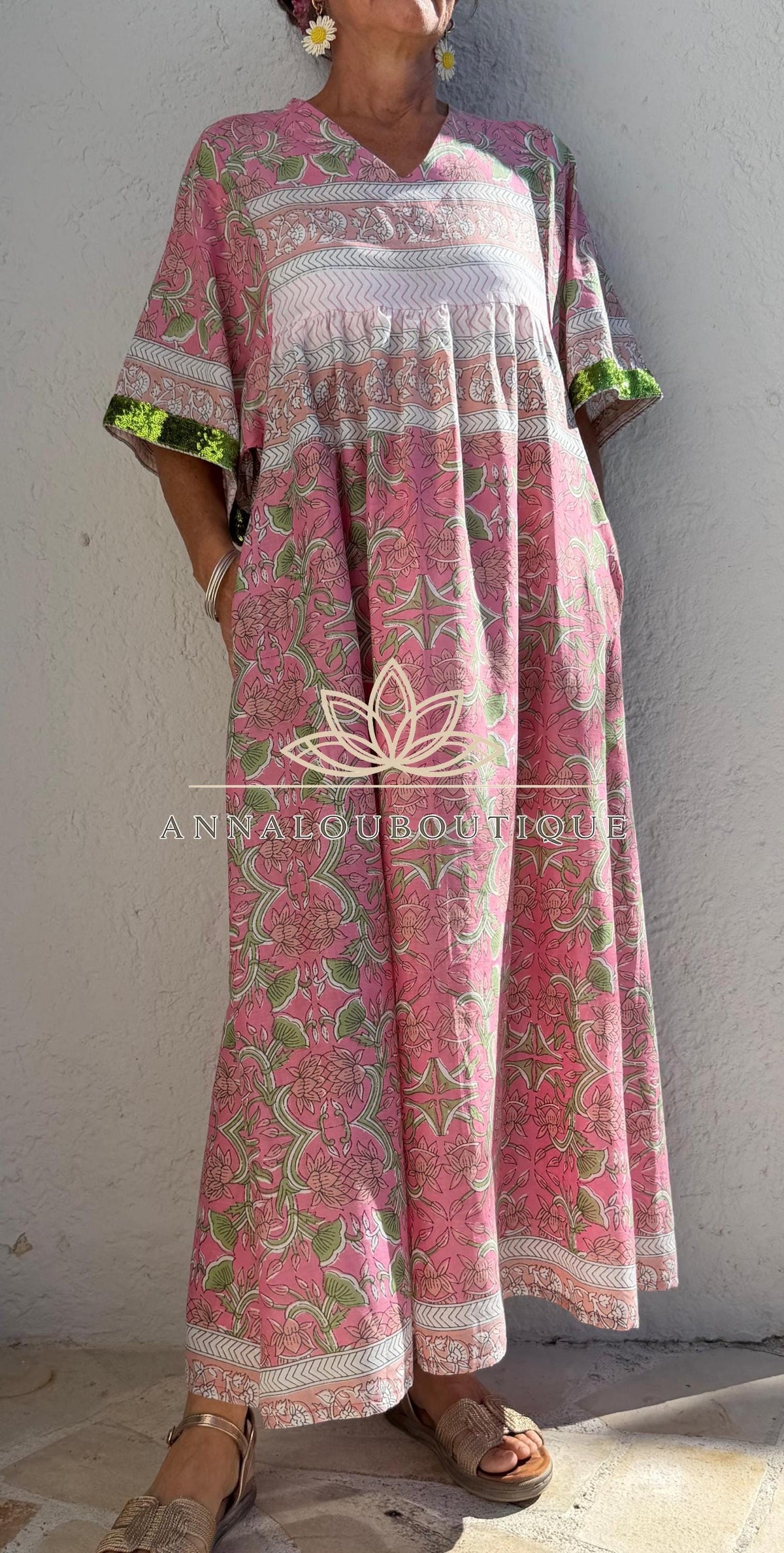 Loose pink and green dress with sequin sleeves