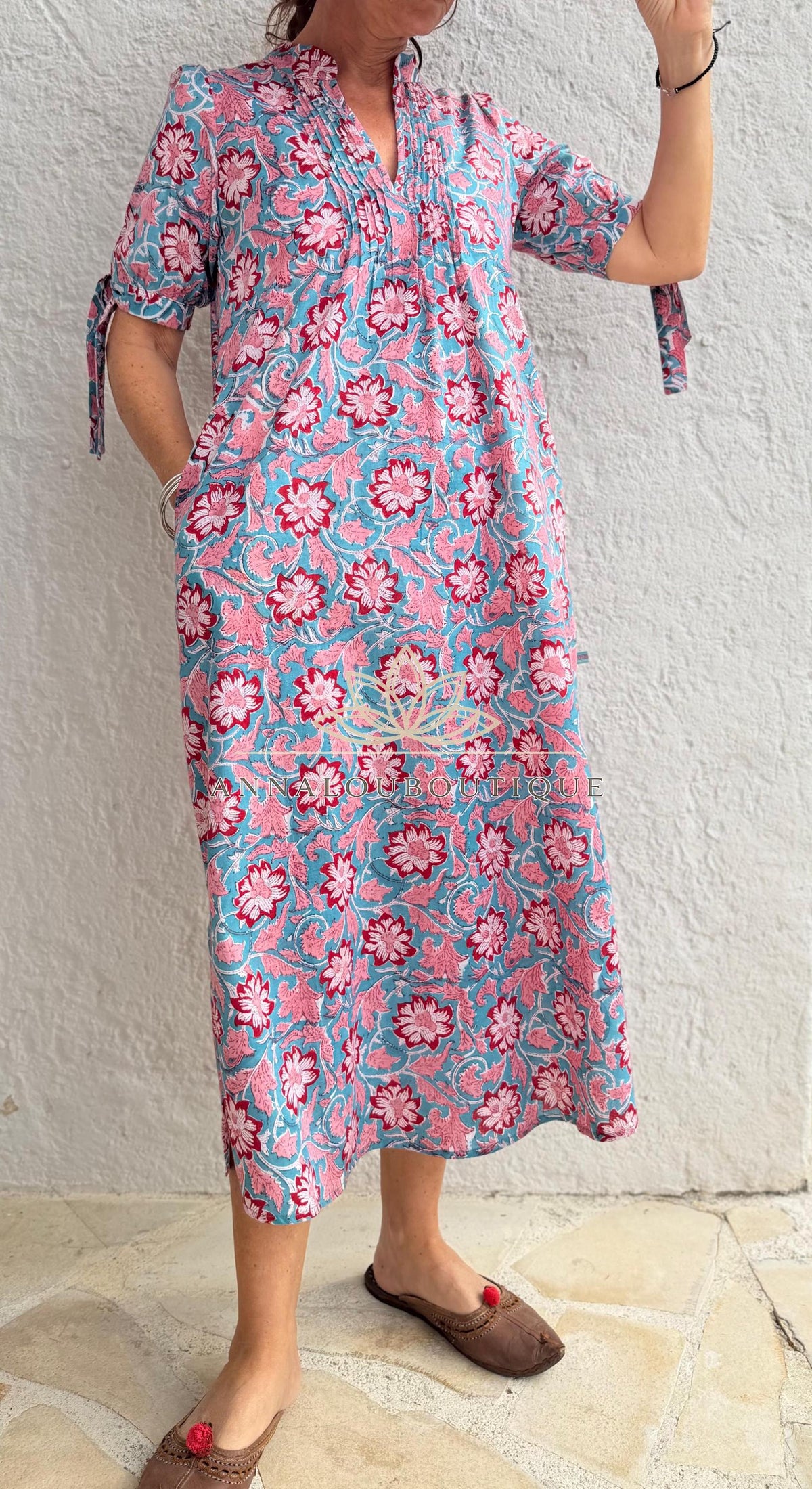 pleat long dress in hand block printed cotton,floral pattern in the shades of pink,red and blue,casual summer outfit
