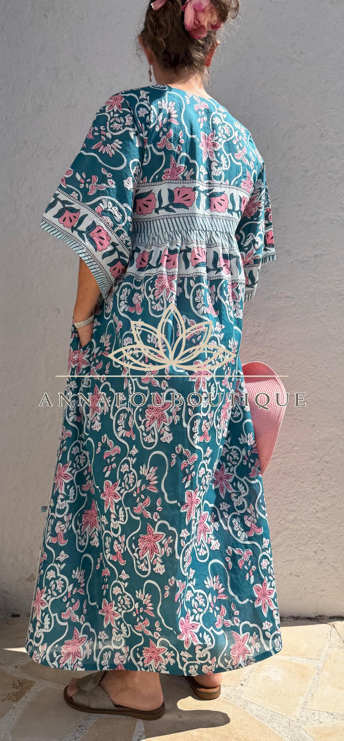 Loose teal dress with pink flowers