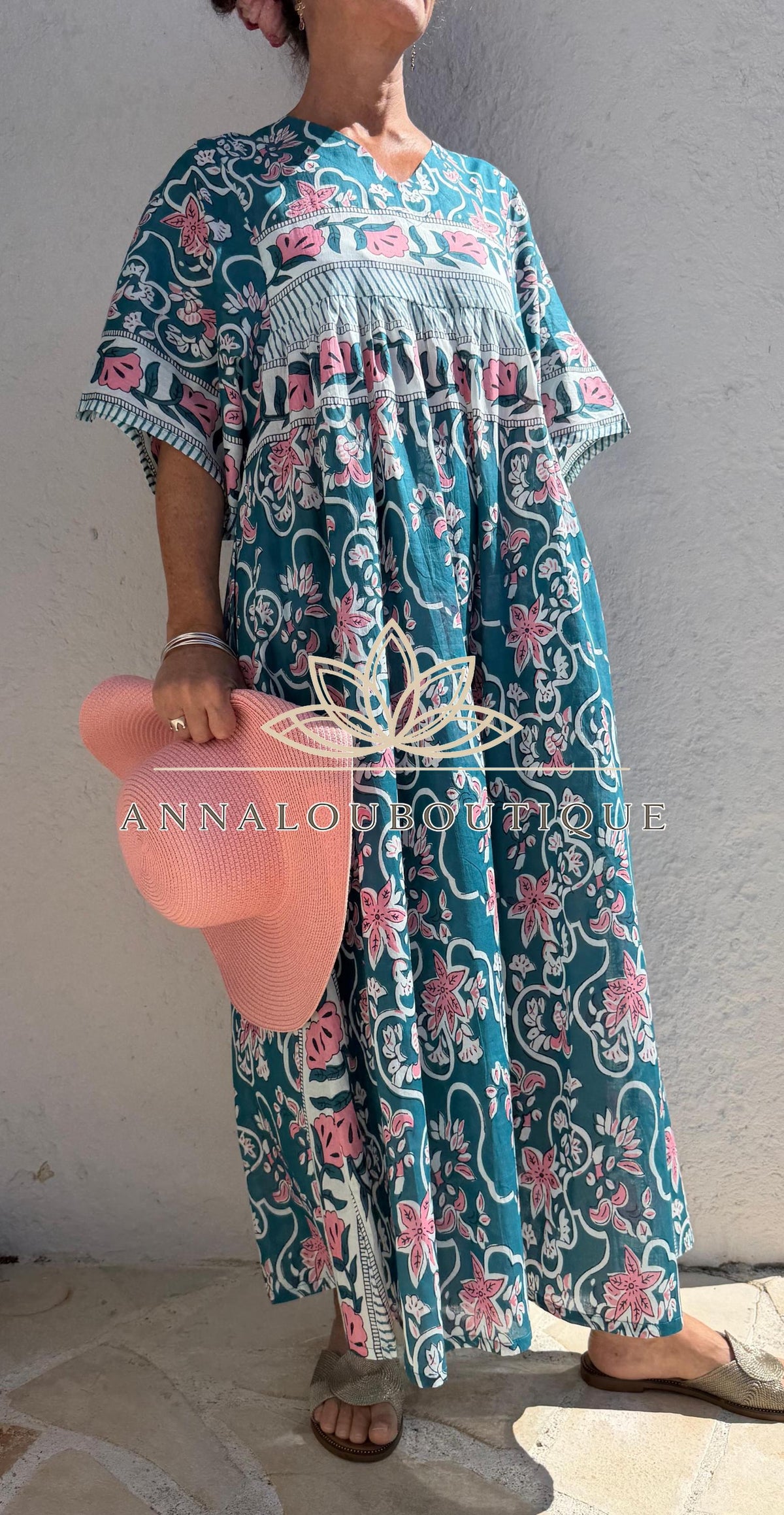 Loose teal dress with pink flowers