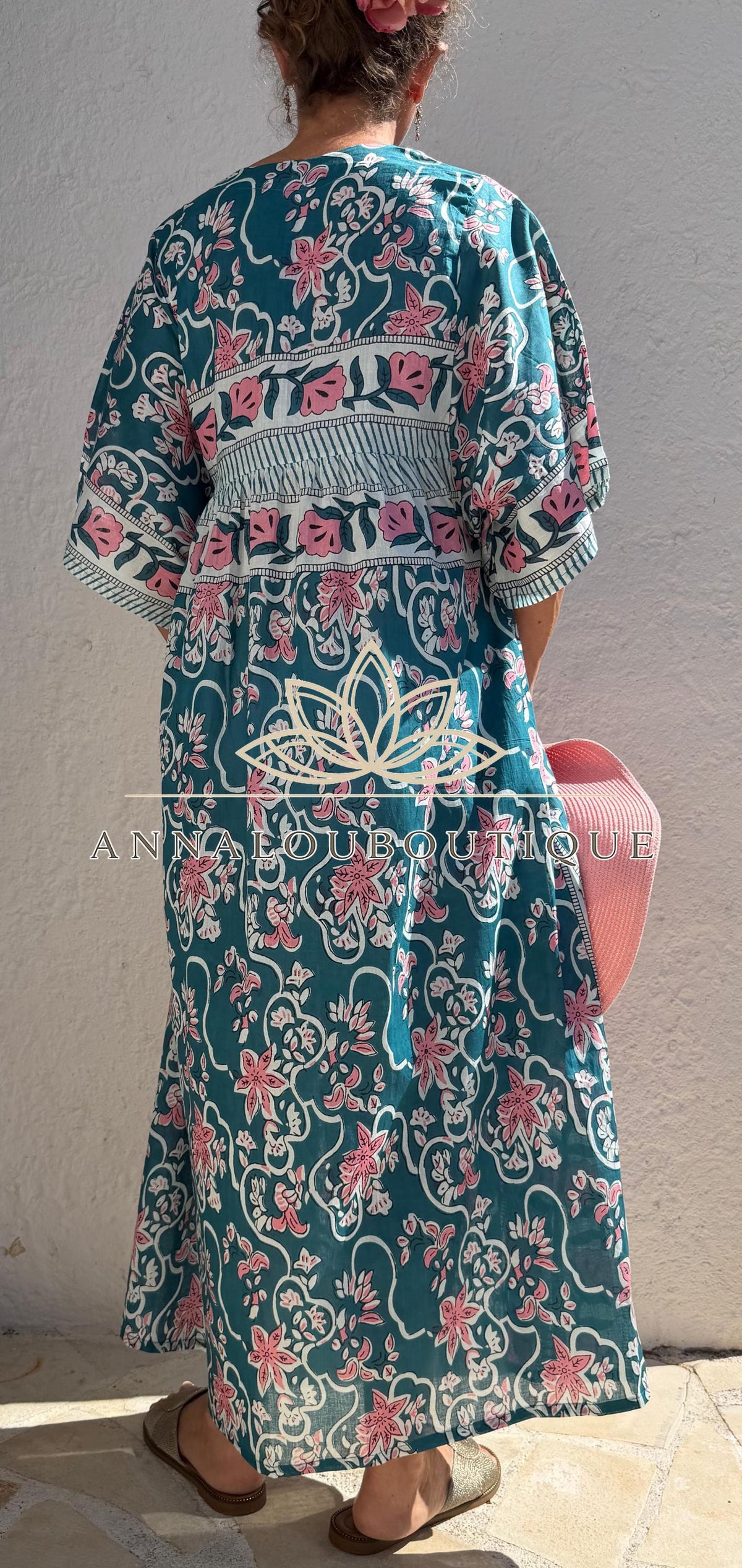 Loose teal dress with pink flowers