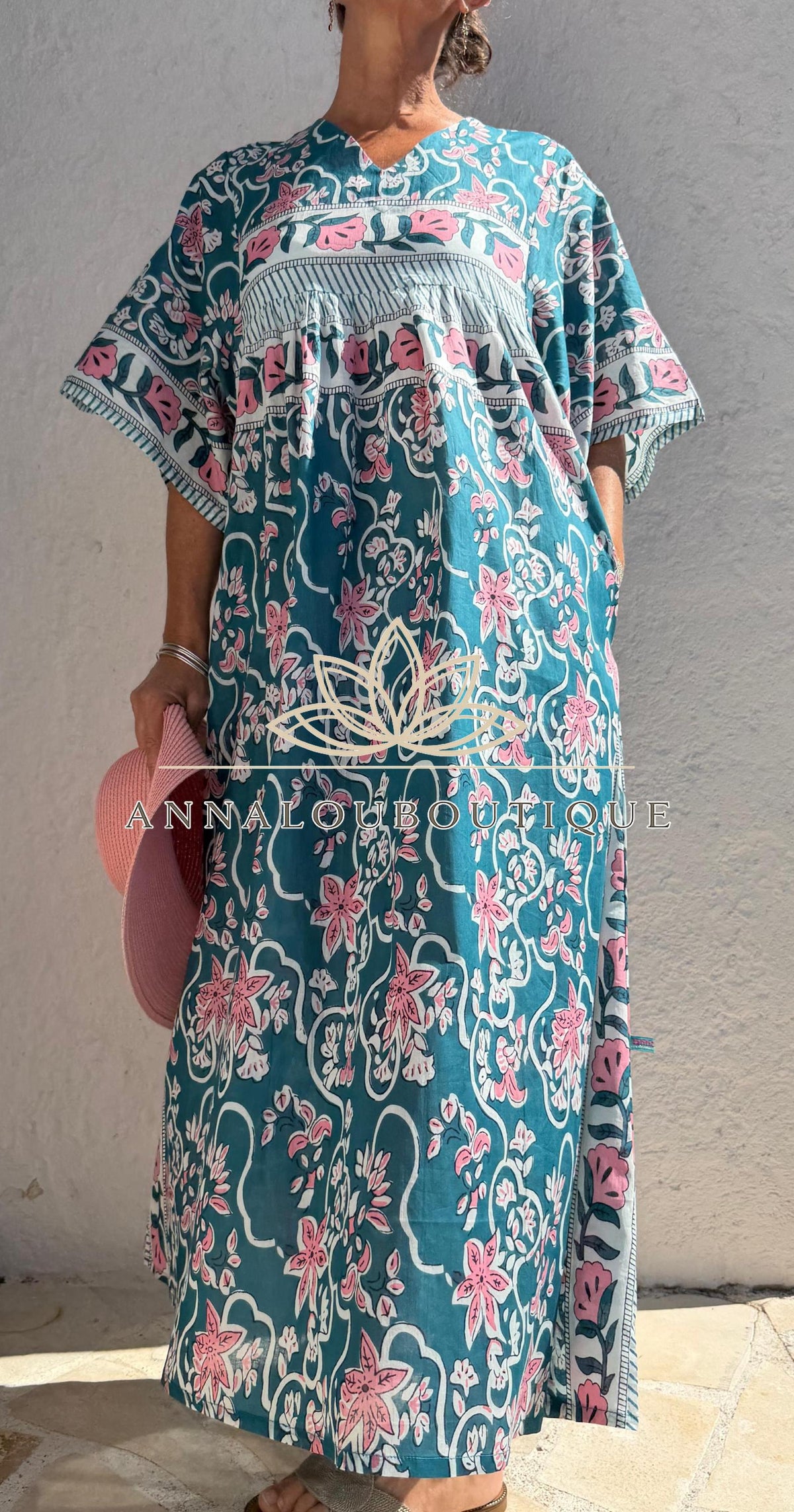 Loose teal dress with pink flowers