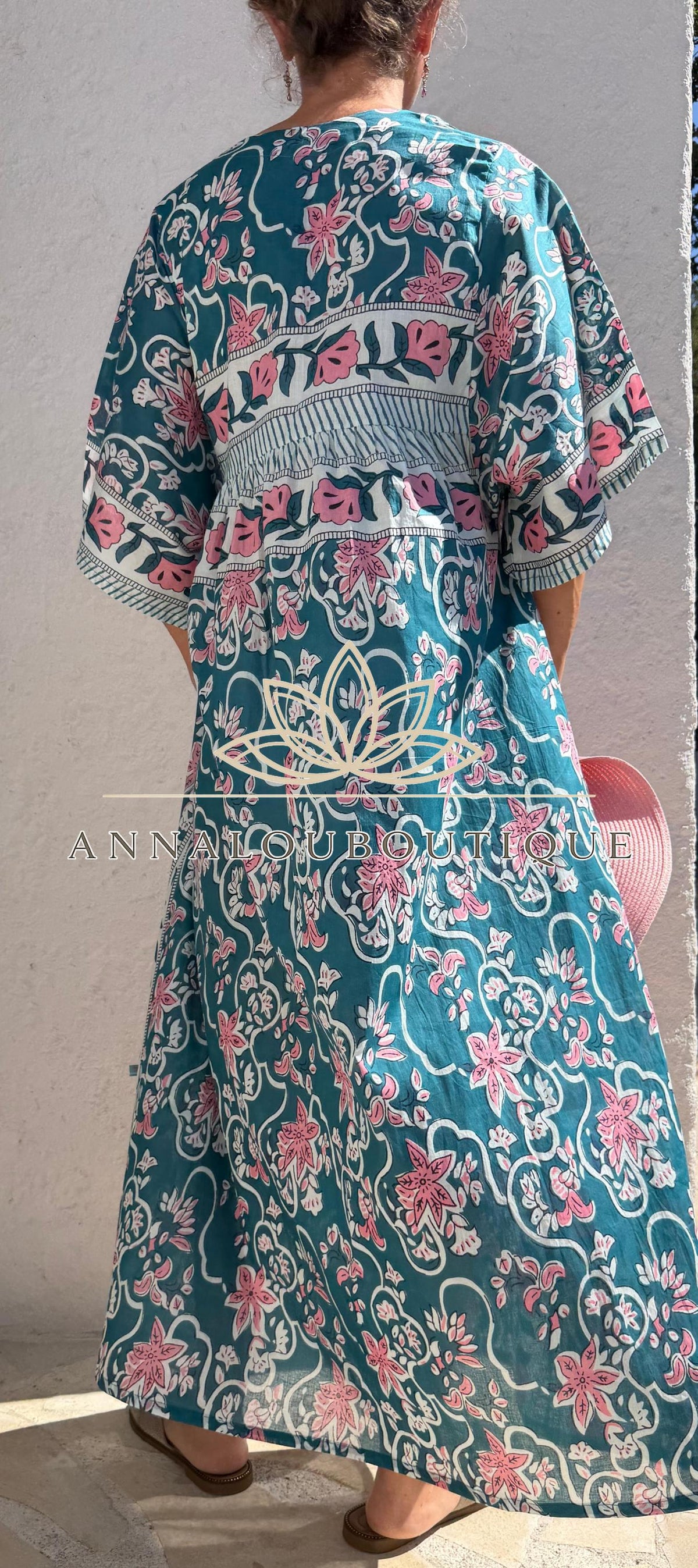 Loose teal dress with pink flowers