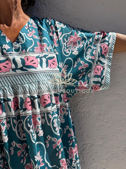 Loose teal dress with pink flowers