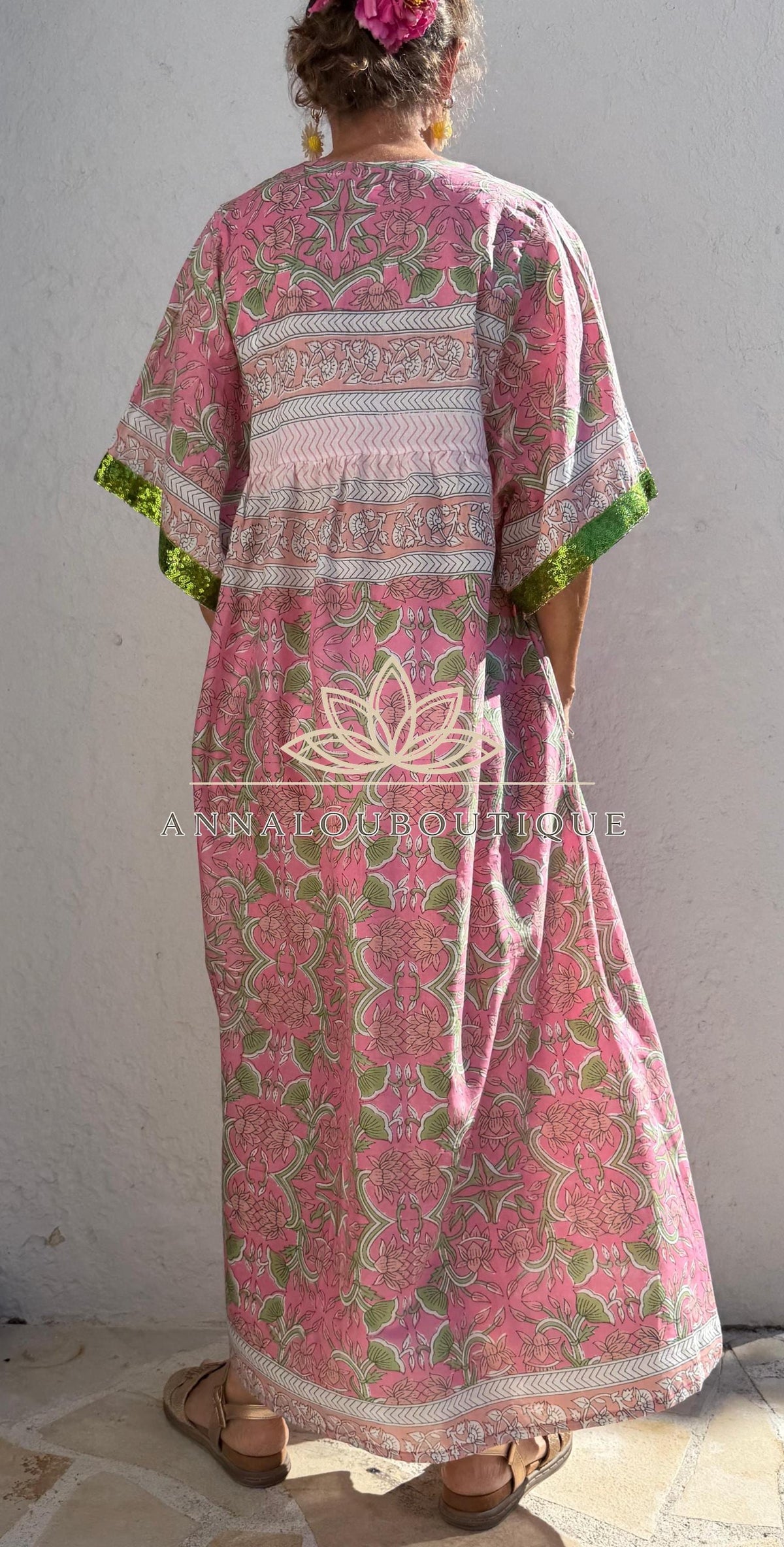 Loose pink and green dress with sequin sleeves