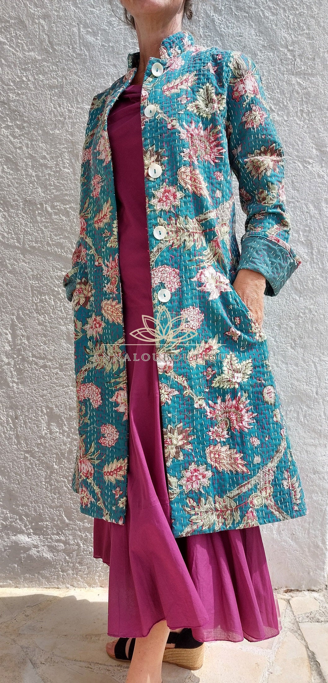 Teal frock coat with pink hydrangeas