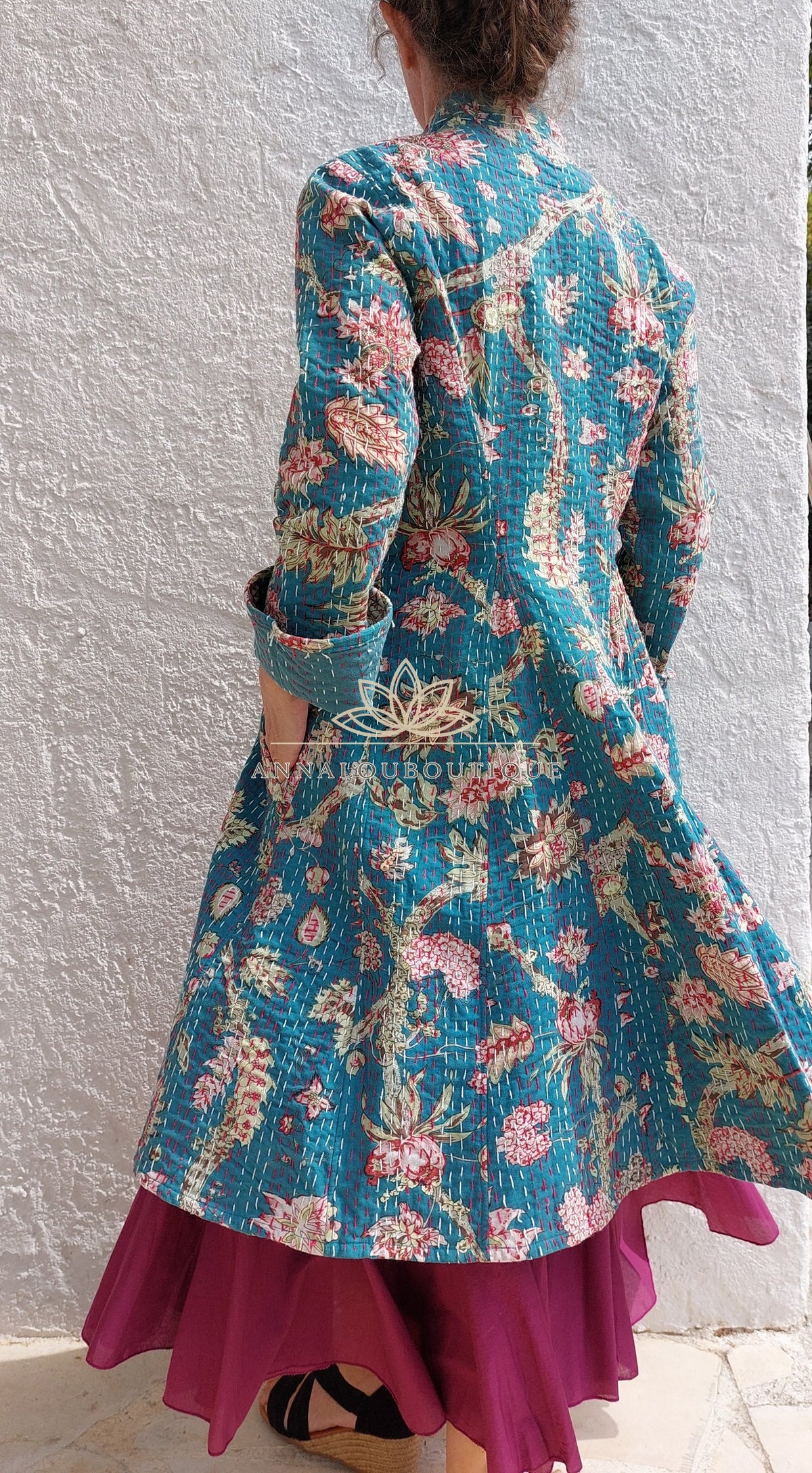 Teal frock coat with pink hydrangeas