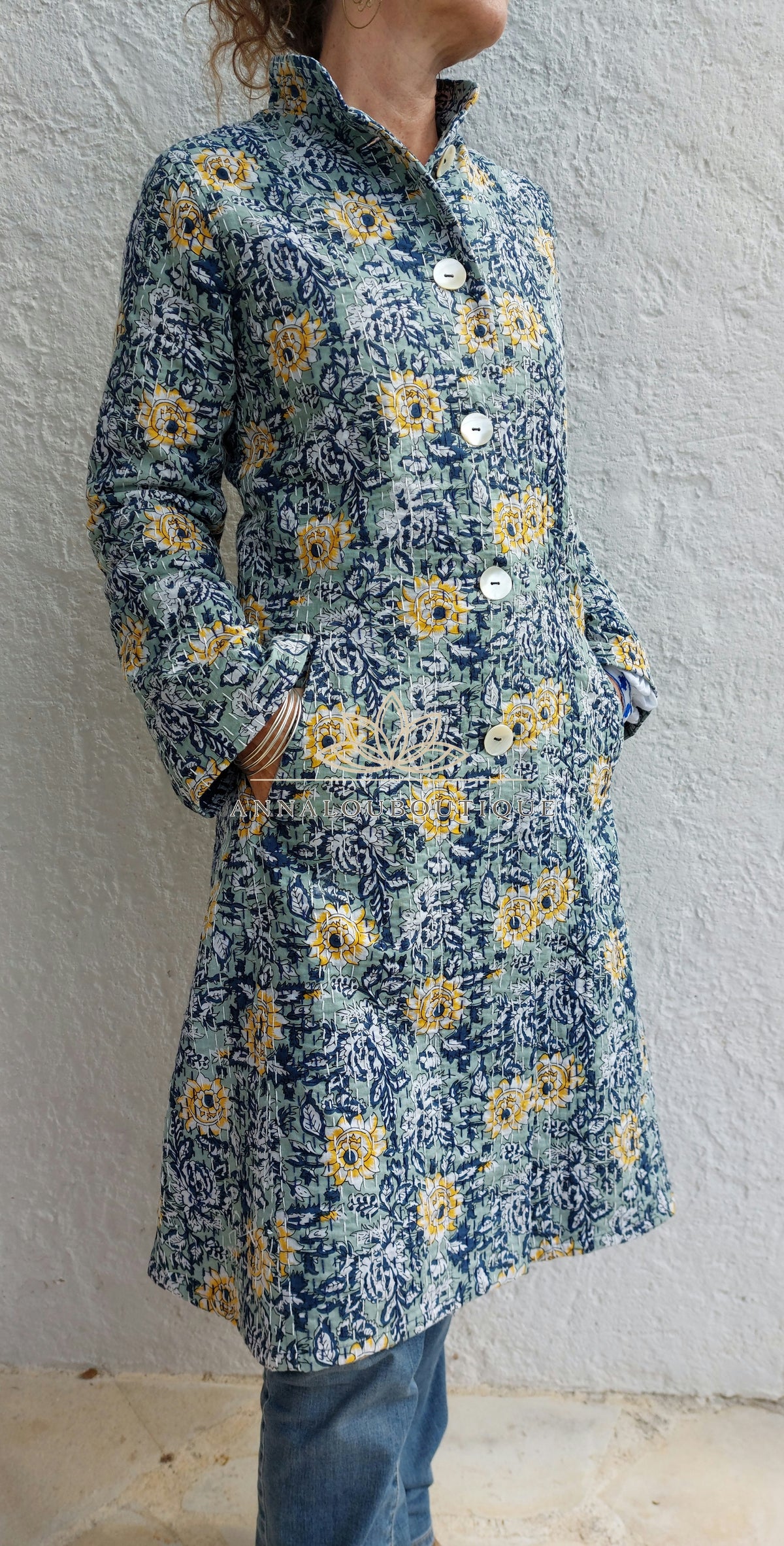 Embroidered navy and green frock coat