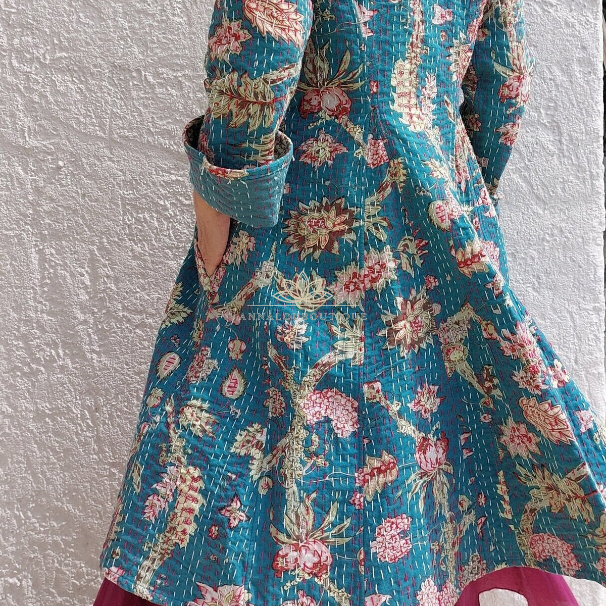 Teal frock coat with pink hydrangeas