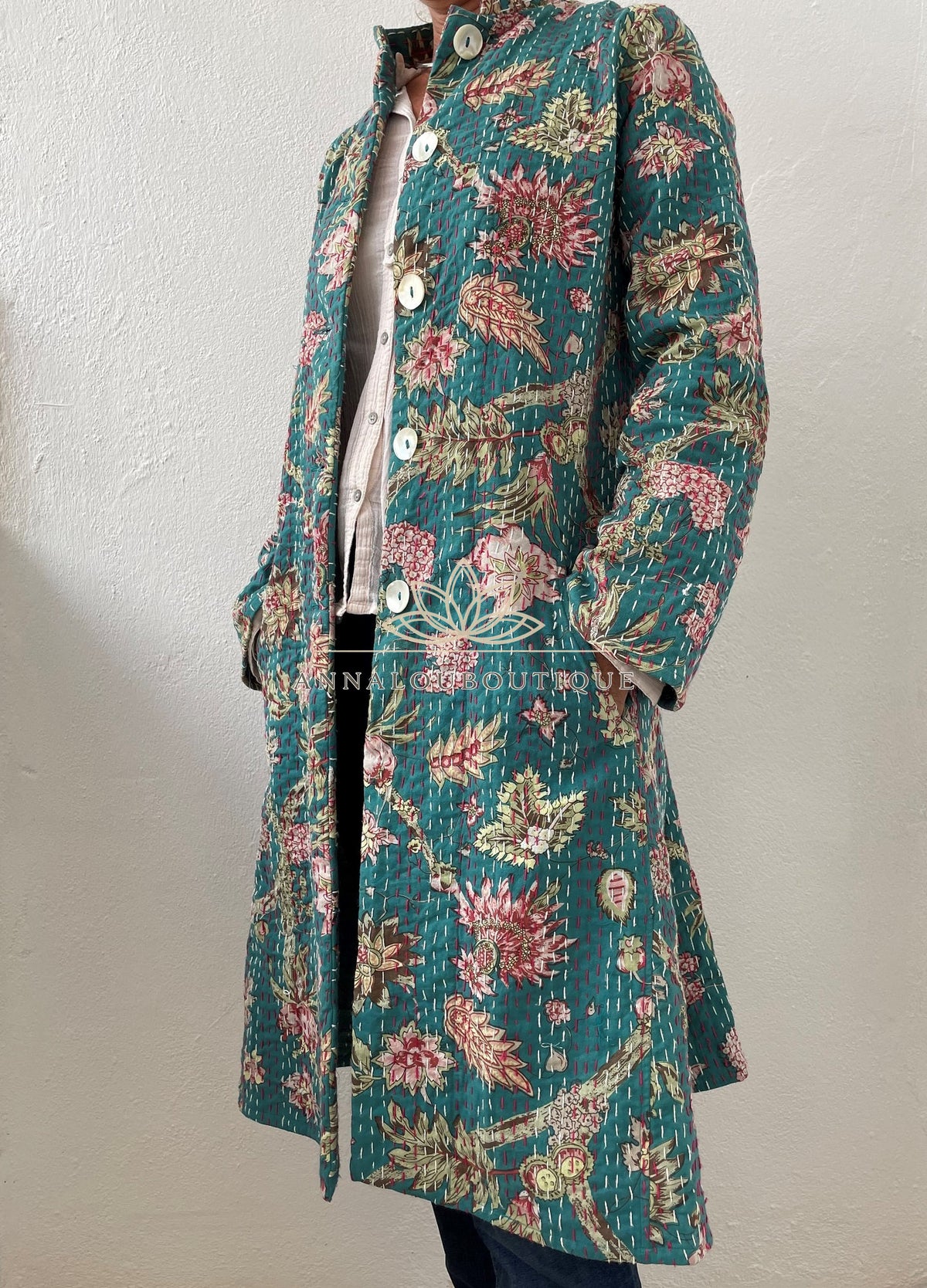 Teal frock coat with pink hydrangeas