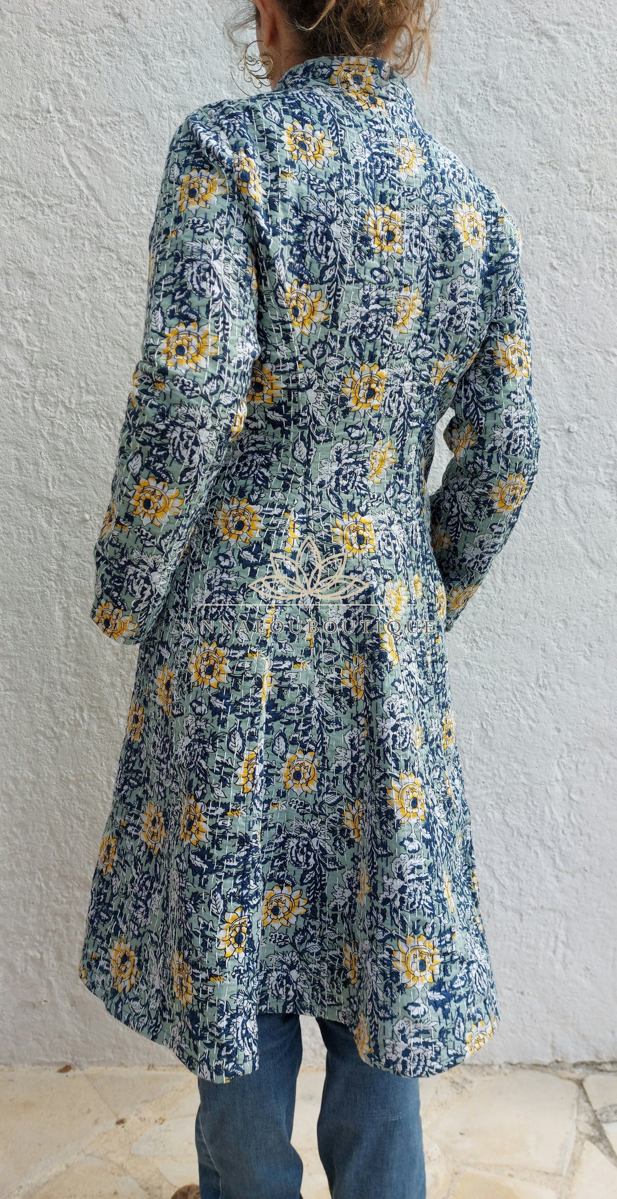 Embroidered navy and green frock coat
